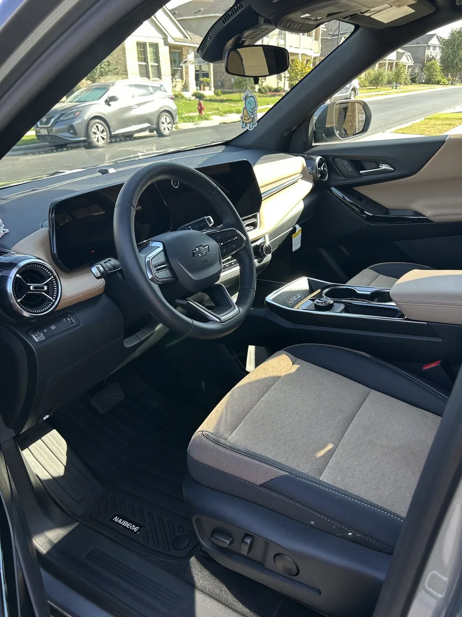 Freshly detailed light-color vehicle interior
