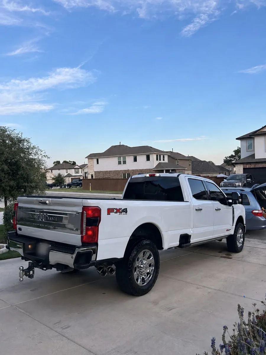 Rear view of a white pickup after detailing